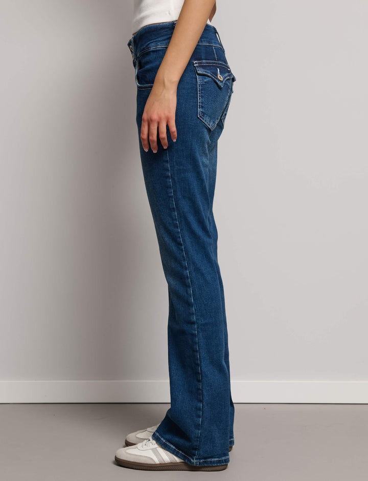 Jeans a zampa con doppio bottone