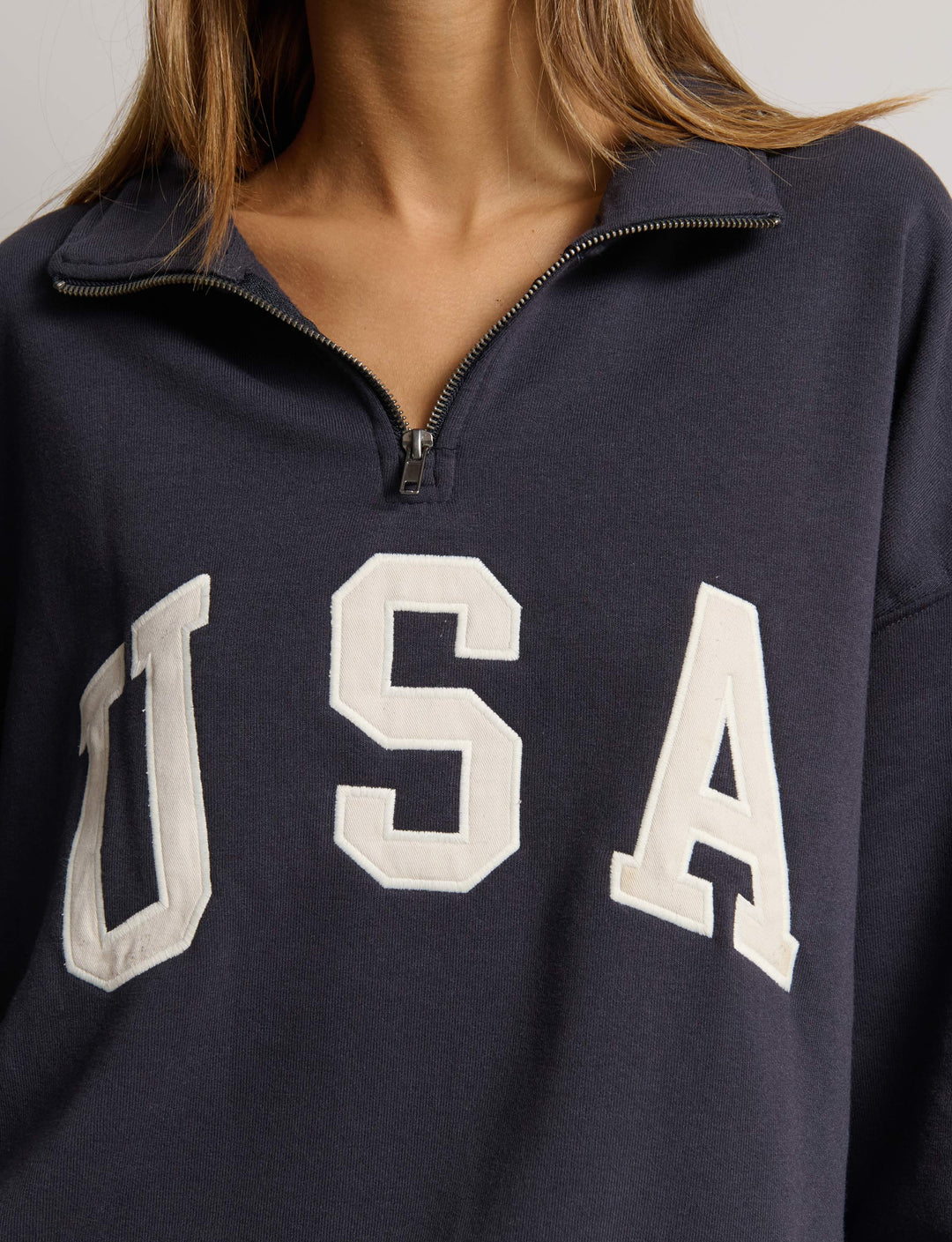 Felpa con applicazione