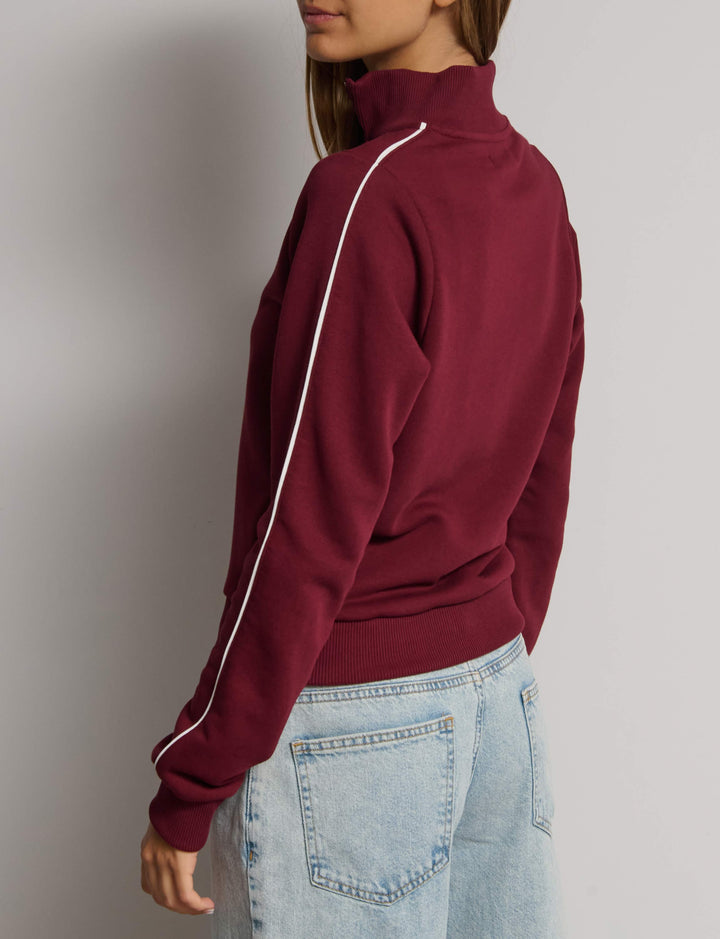 Felpa collo alto con ricamo