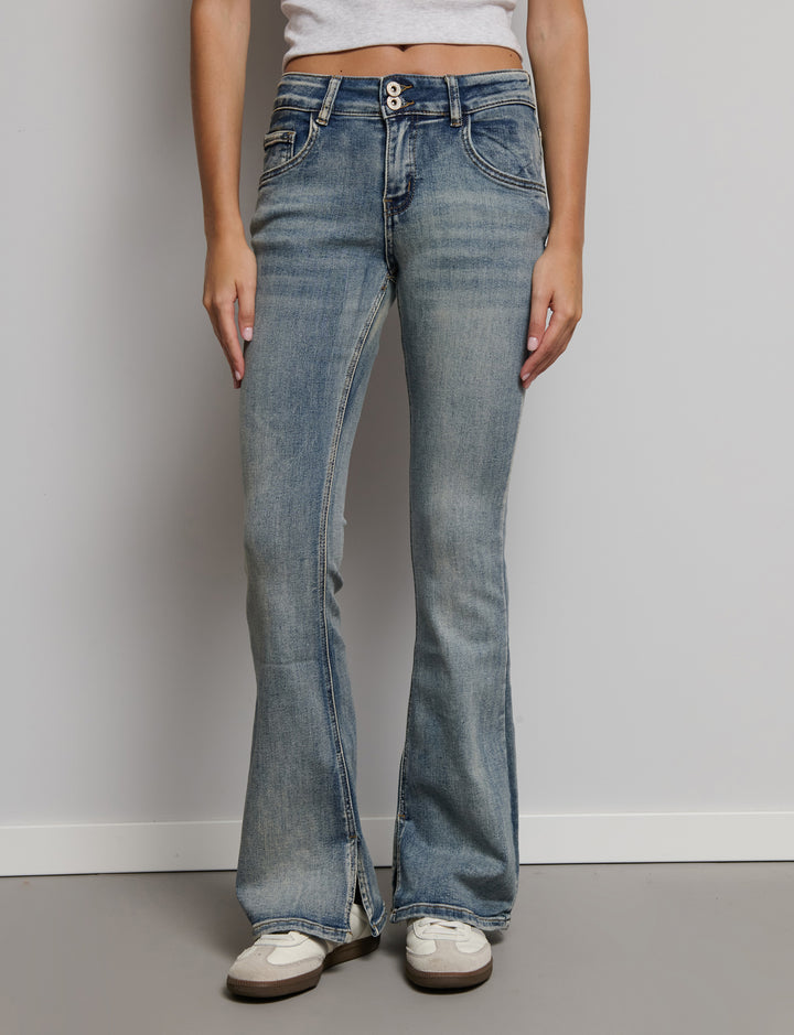 Jeans a zampa con doppio bottone