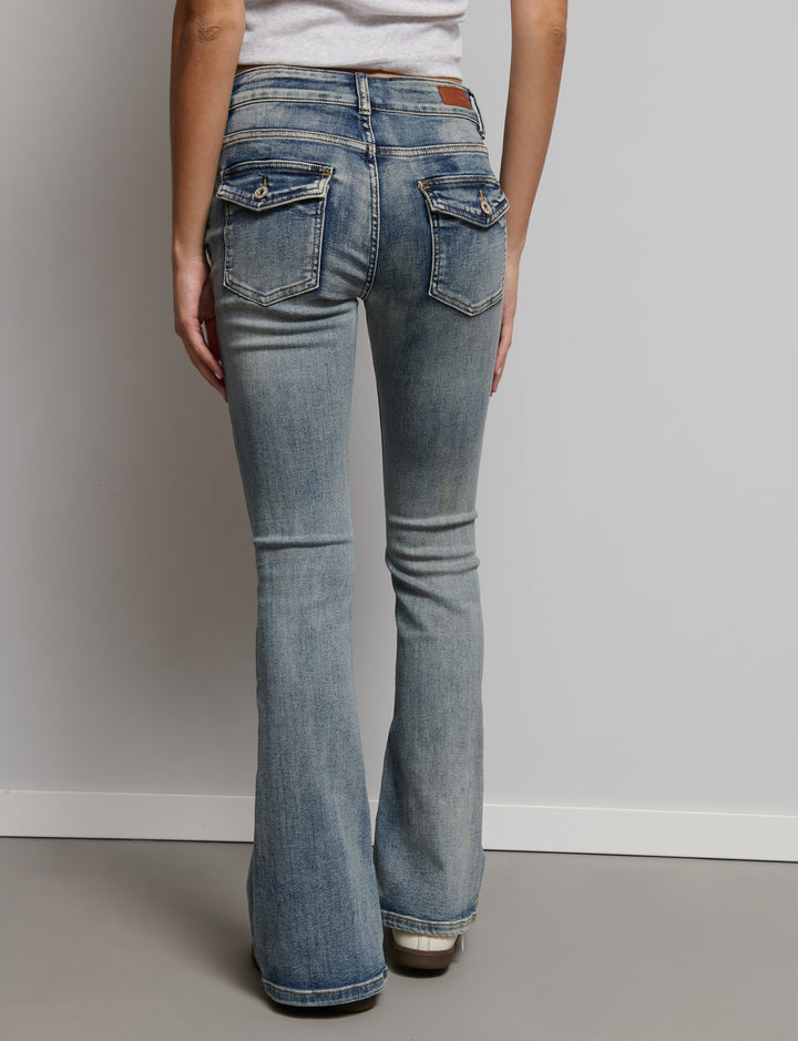 Jeans a zampa con doppio bottone