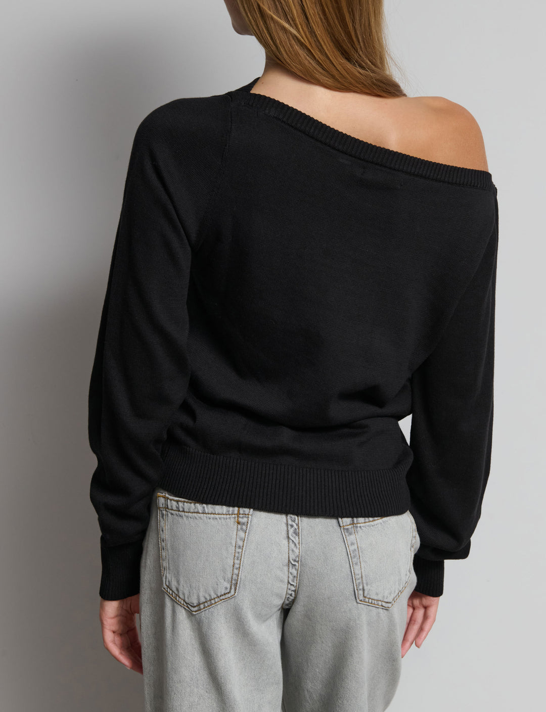 Maglia con spalle scoperte