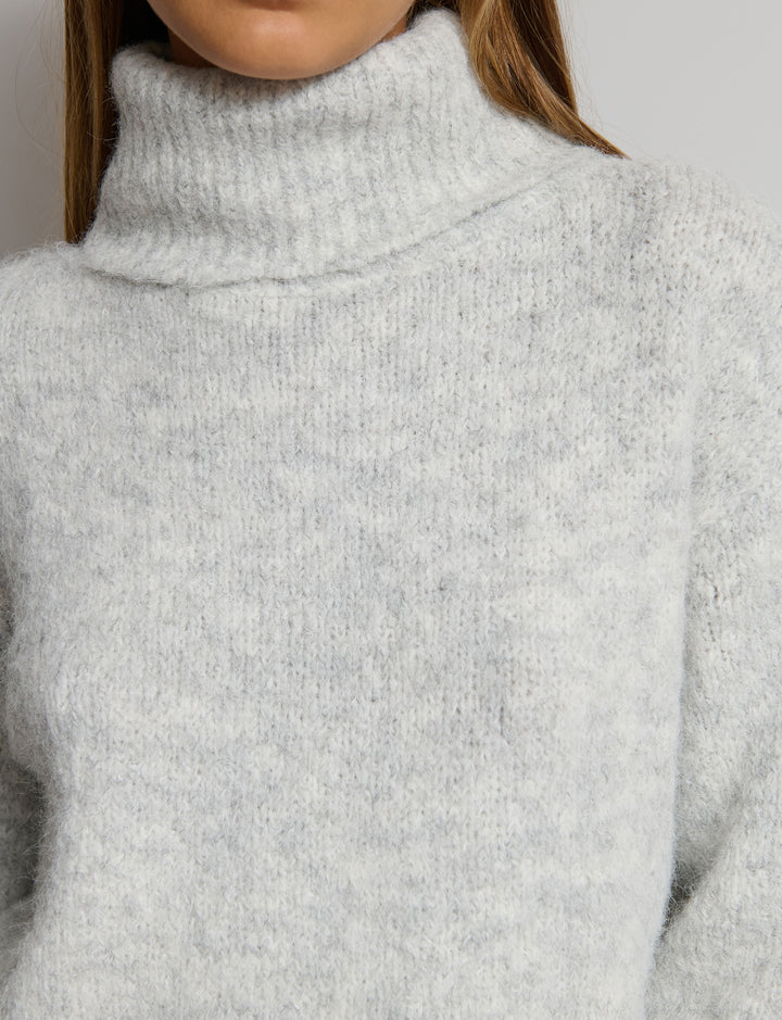 Maglione morbido collo alto