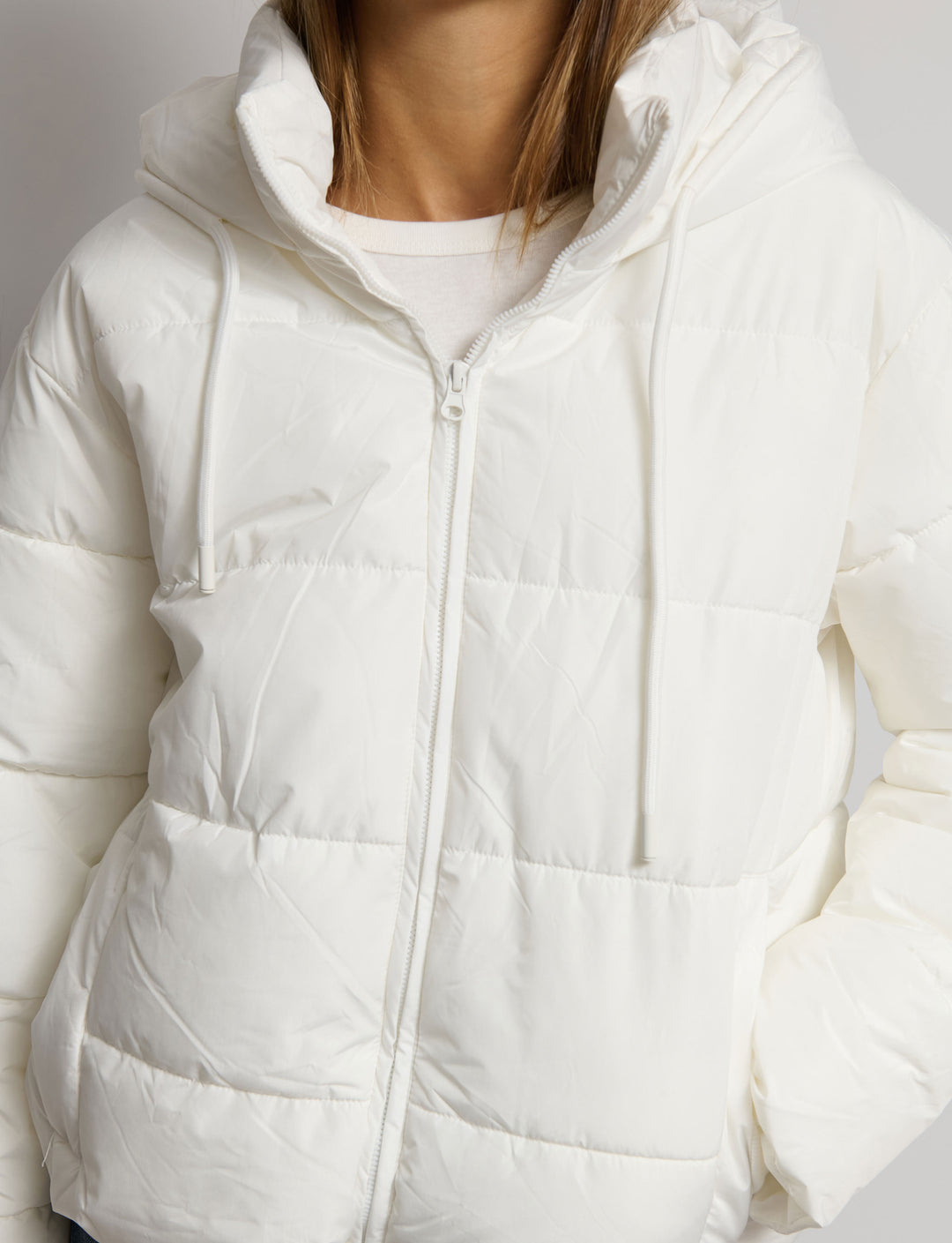 Piumino con cappuccio