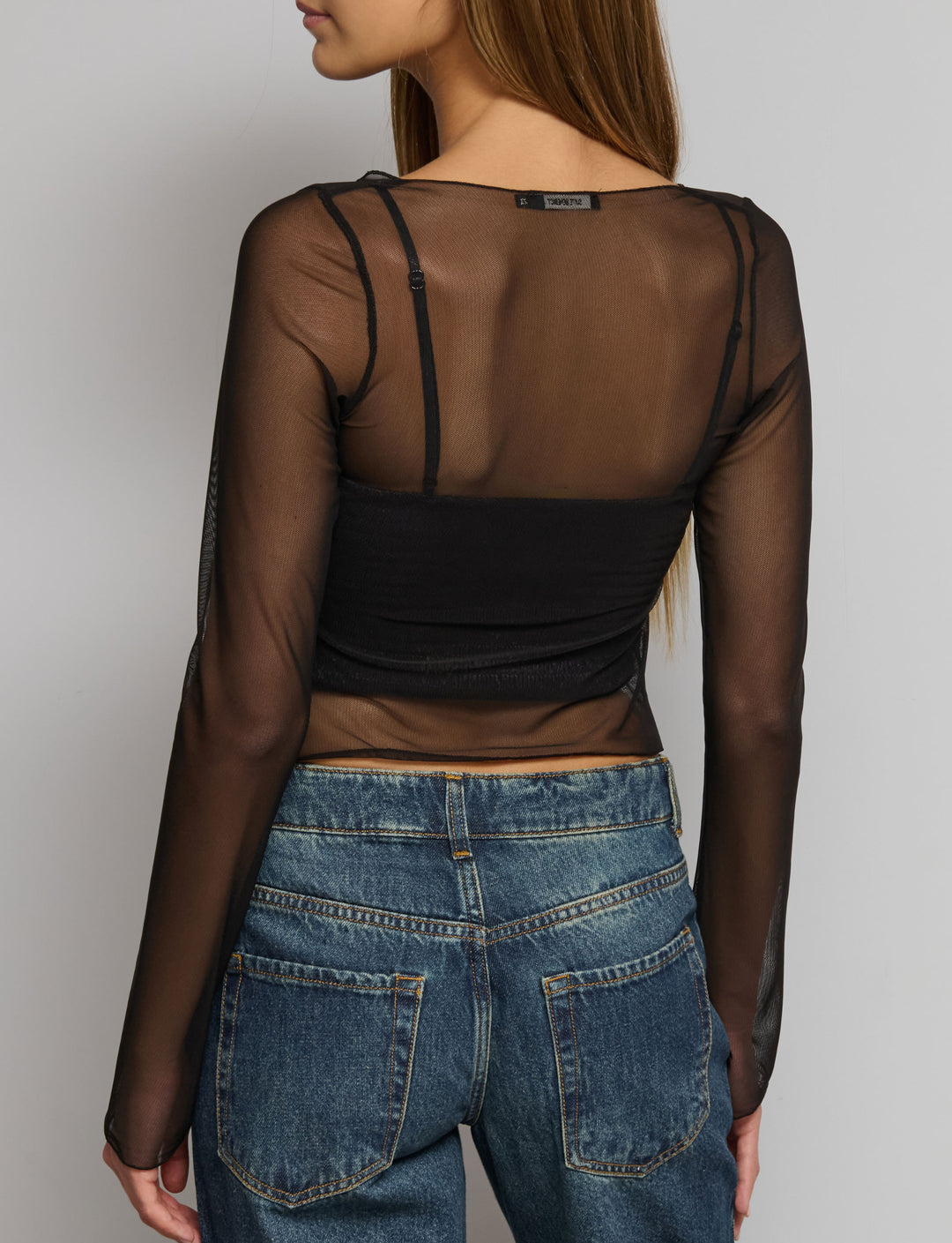 Top coprispalle in rete