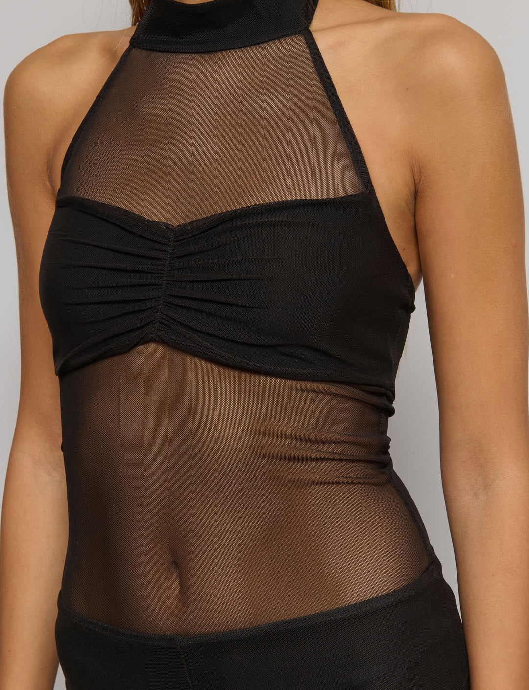 Tutina con trasparenze