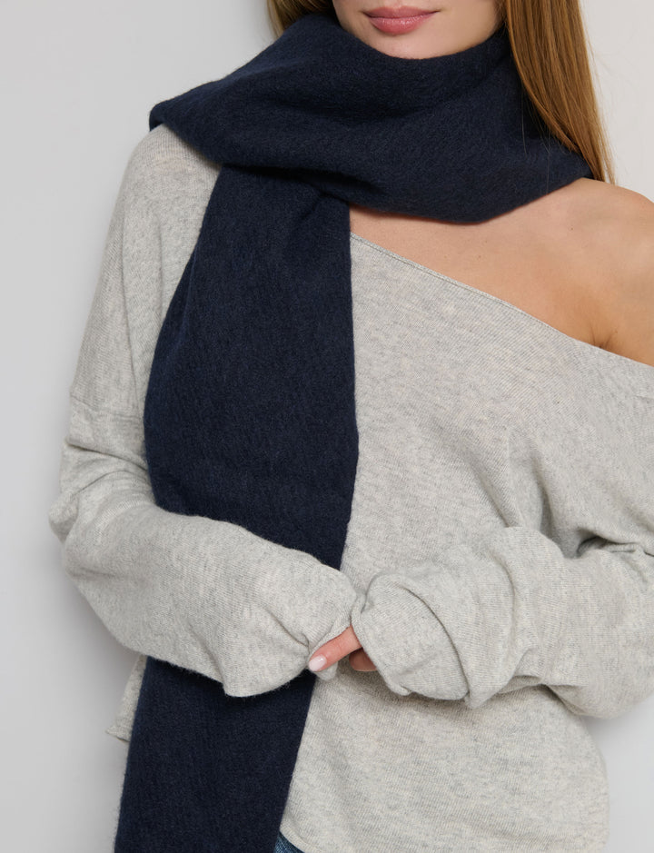 Sciarpa tinta unita con frange