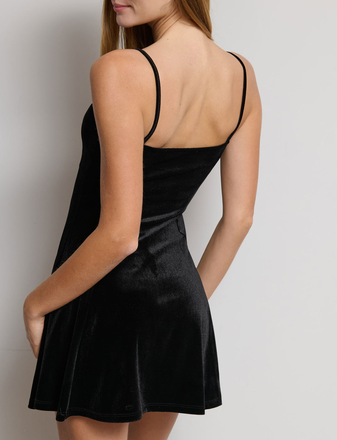 Abito in velluto con gonna svasata