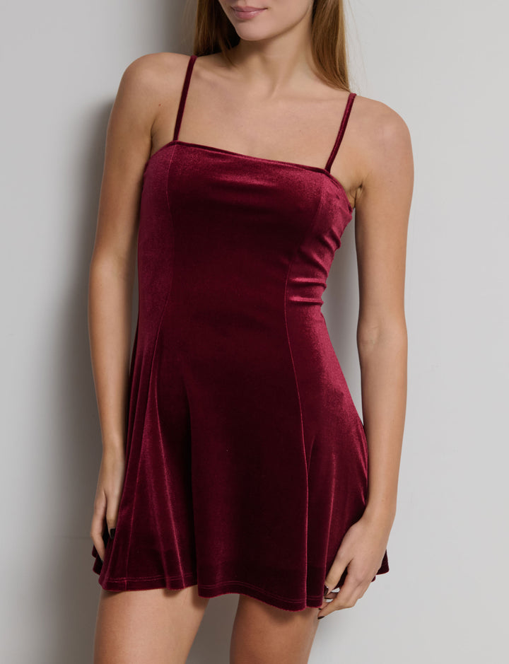 Abito in velluto con gonna svasata