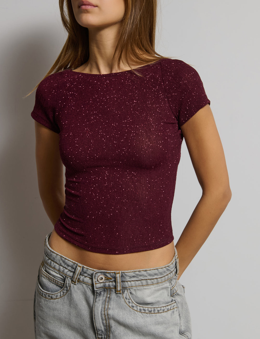 Top manica corta in tessuto glitter