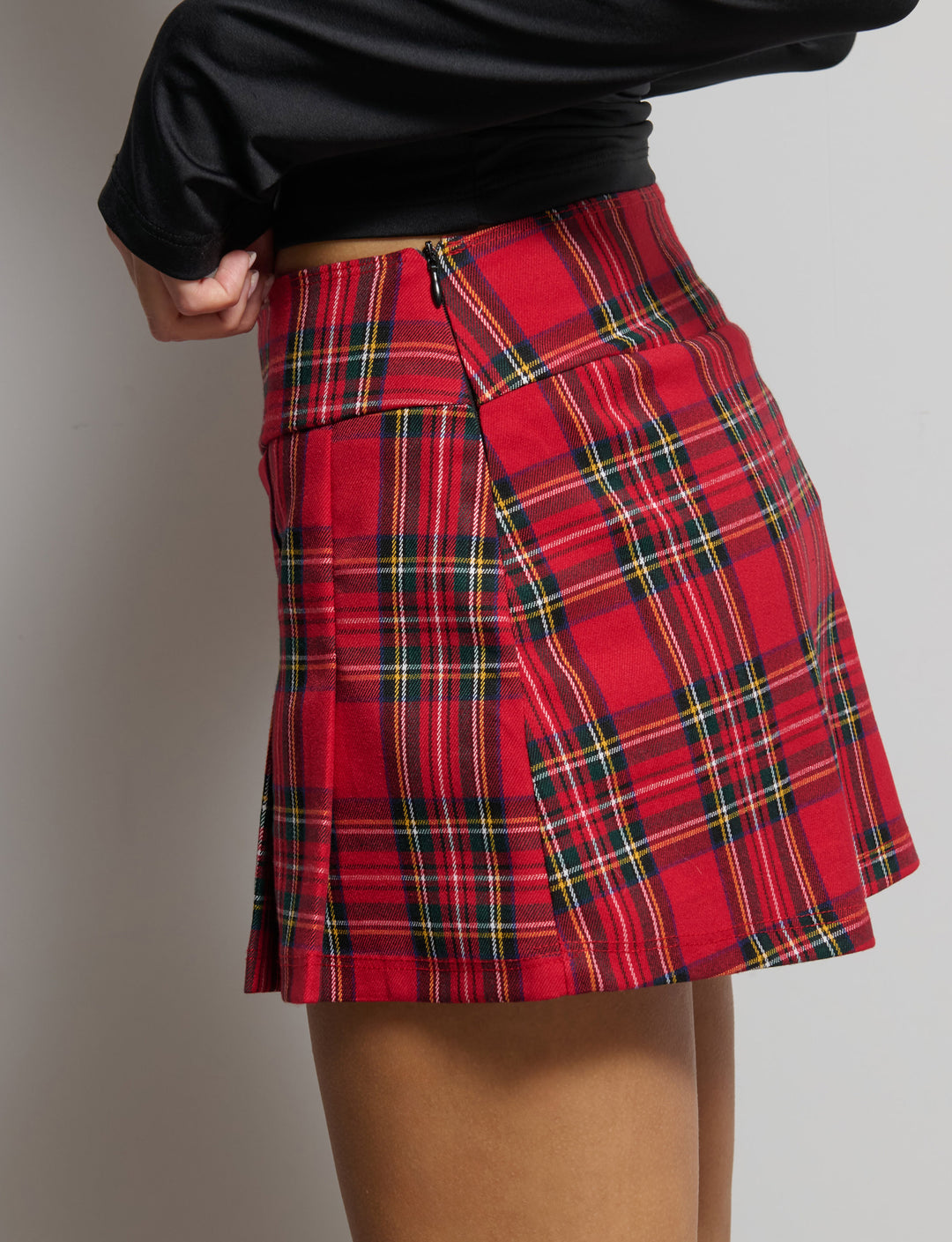 Skort a quandri con pieghe