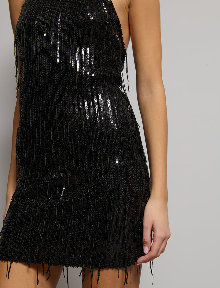 Abito in paillettes con frange