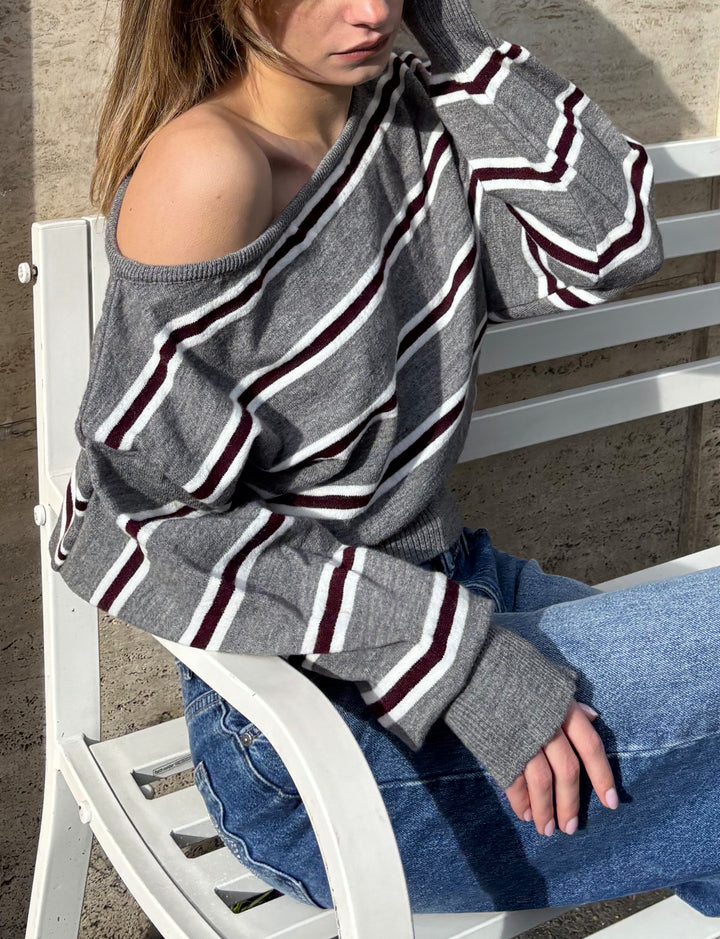 Maglione off-shoulder a righe