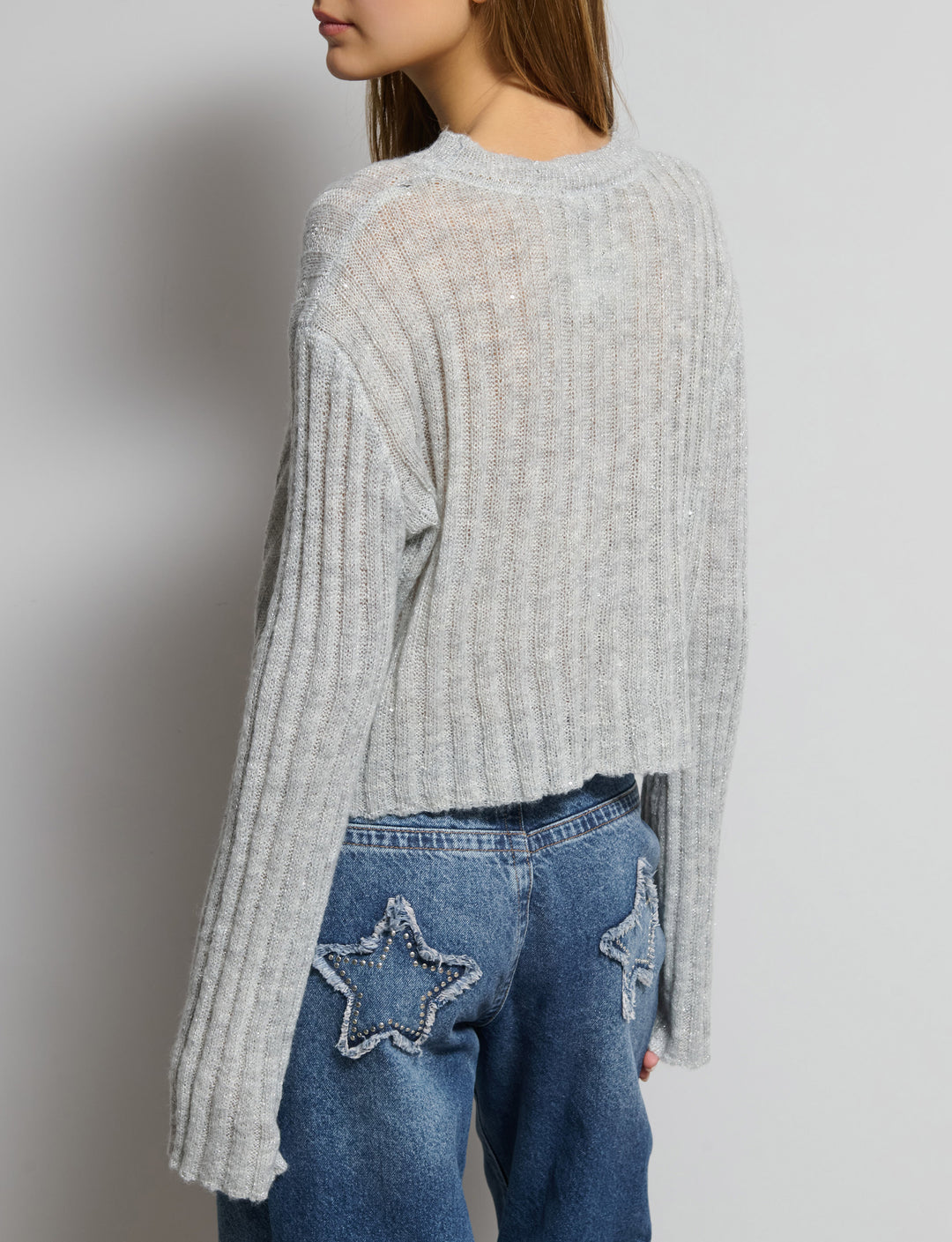 Maglioncino crop con paillettes