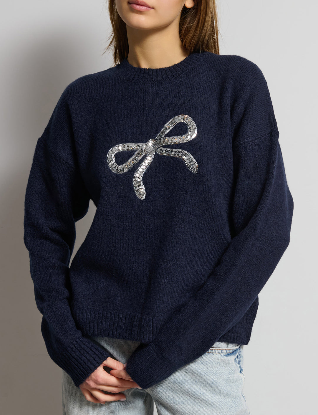 Mglione con fiocco in paillettes