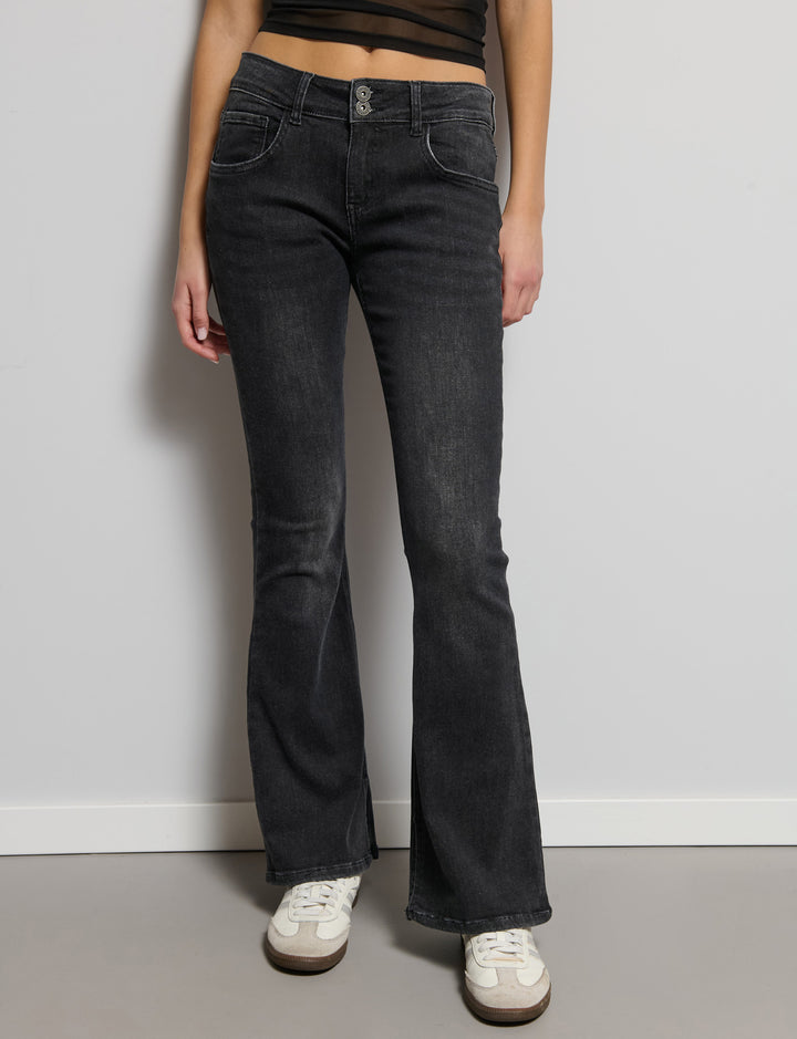 Jeans a zampa con doppio bottone