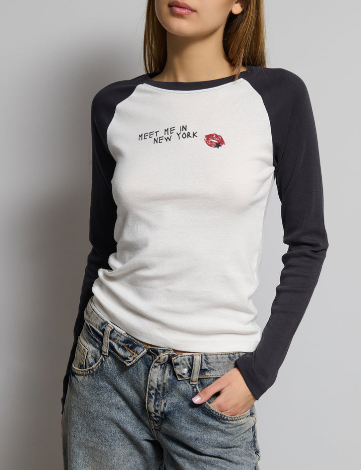 T-shirt stampata raglan