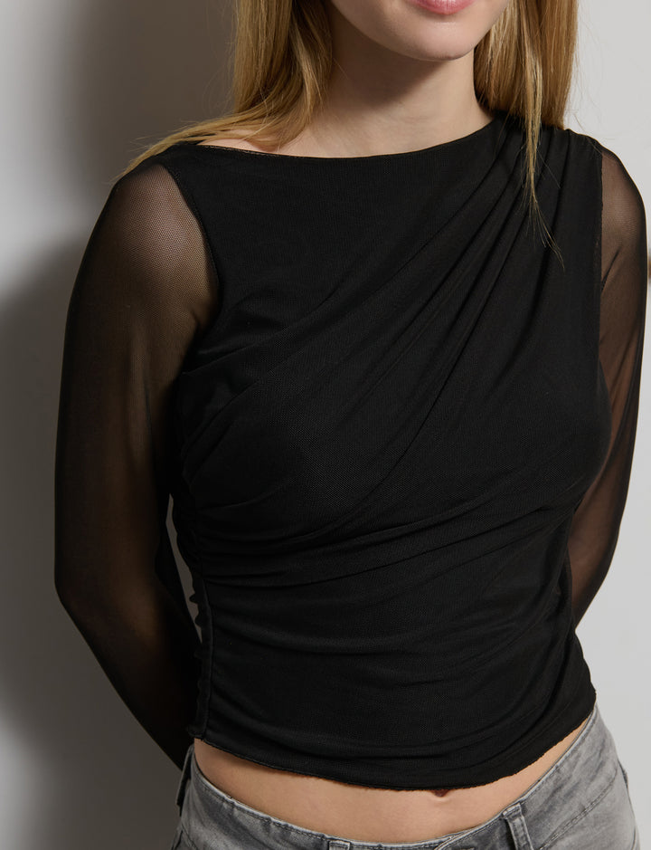 Top in rete con trasparenze