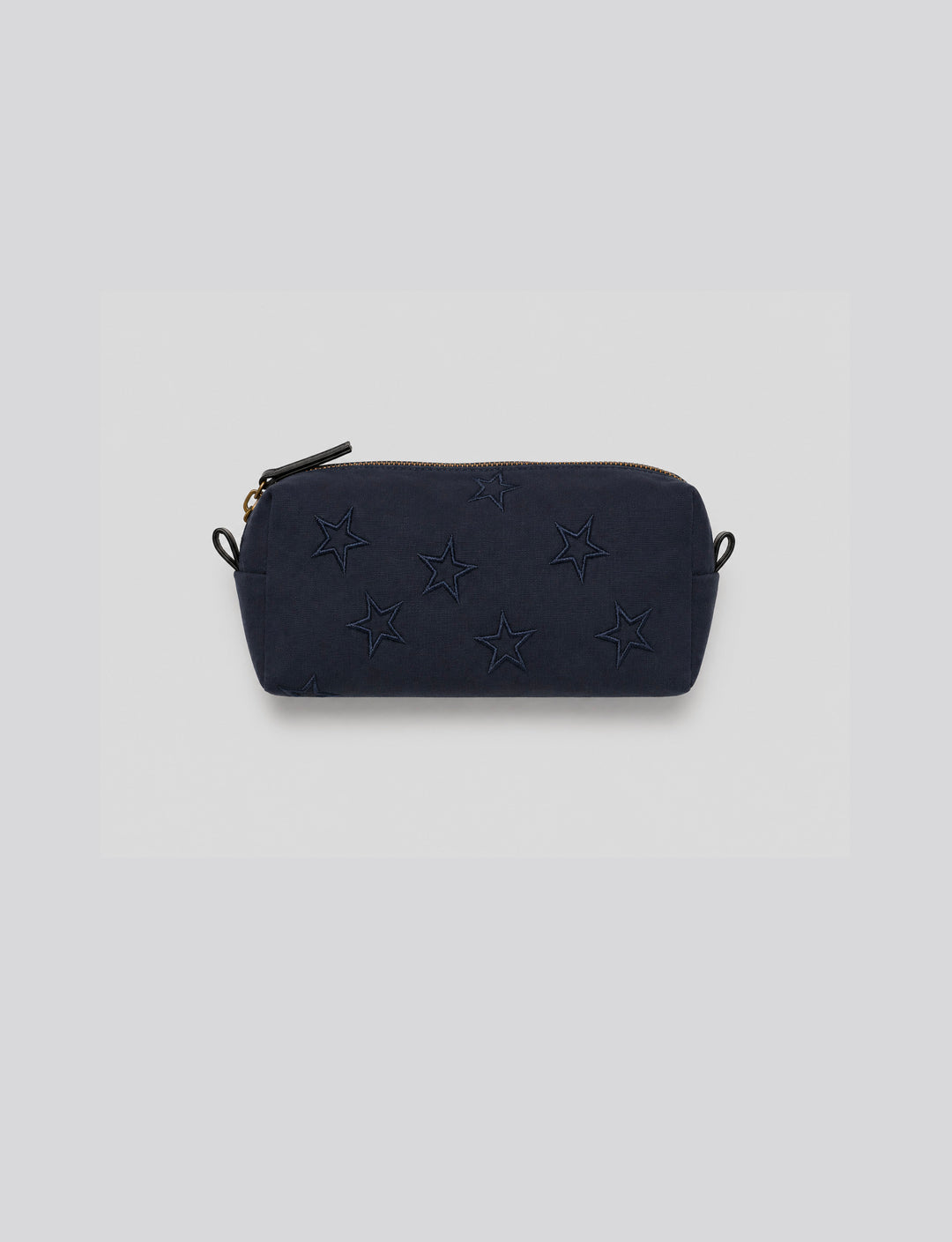 Astuccio in felpa blu con stelle ricamate still life