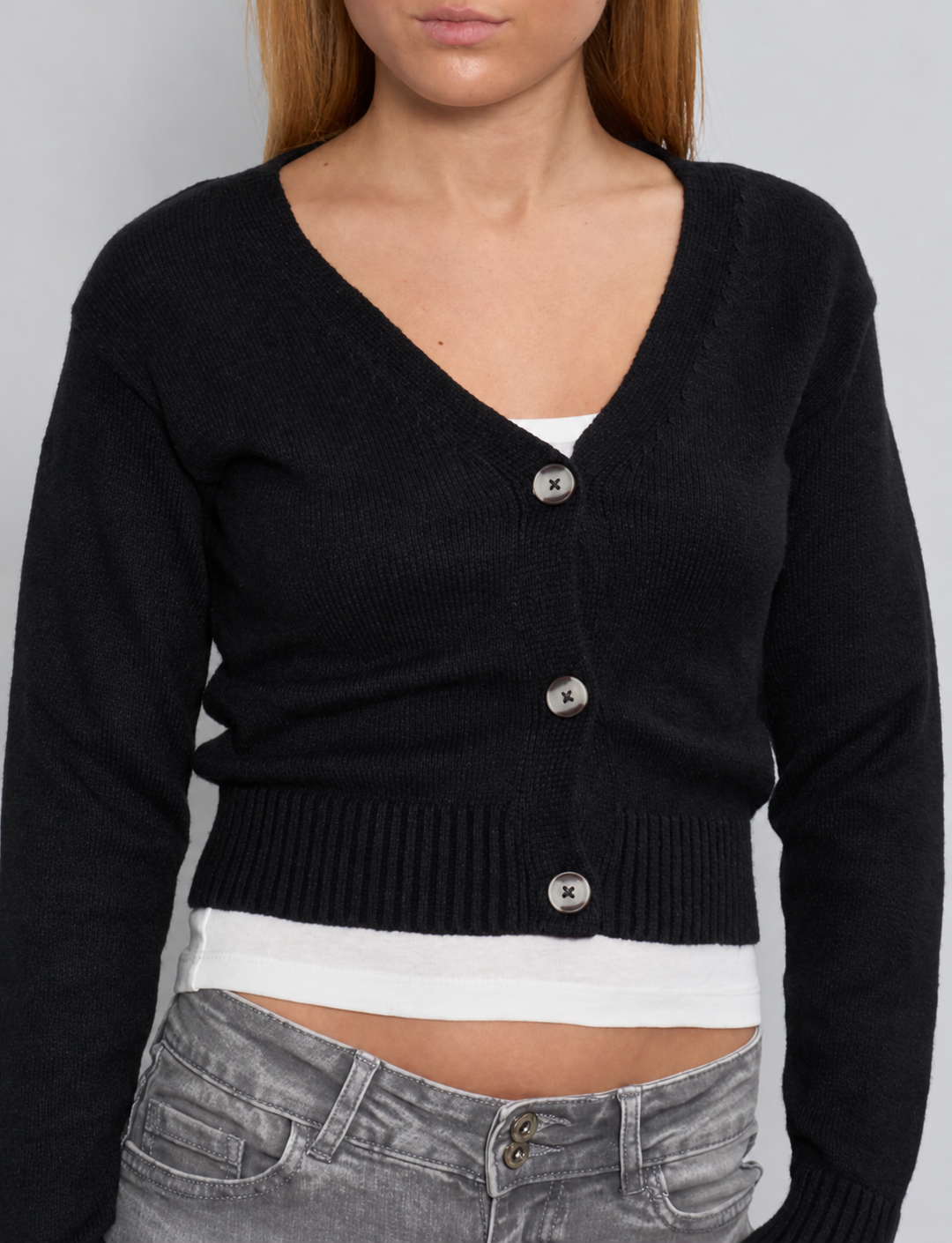 Cardigan crop nero con bottoni dettaglio
