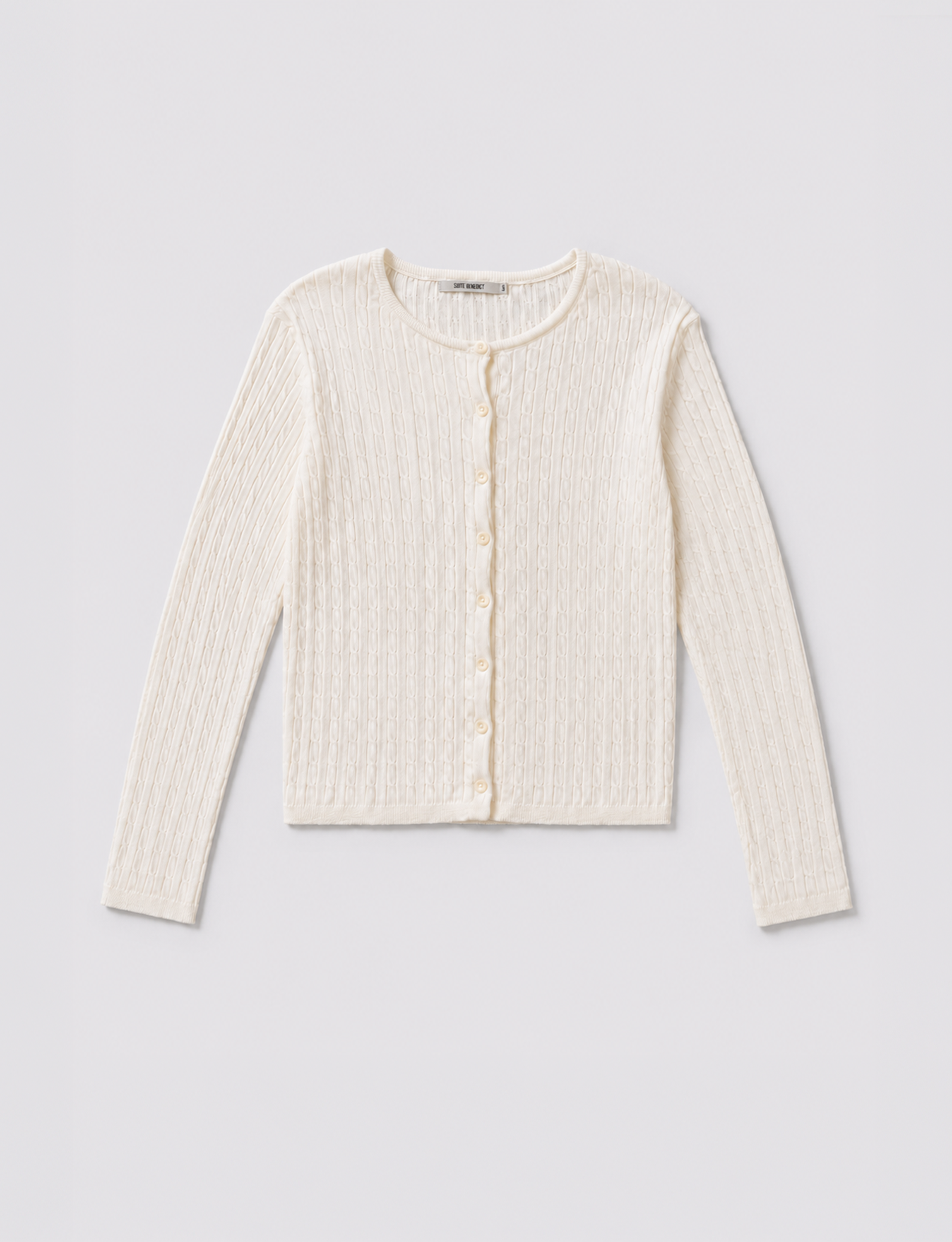 Cardigan in cotone panna con lavorazione a trecce