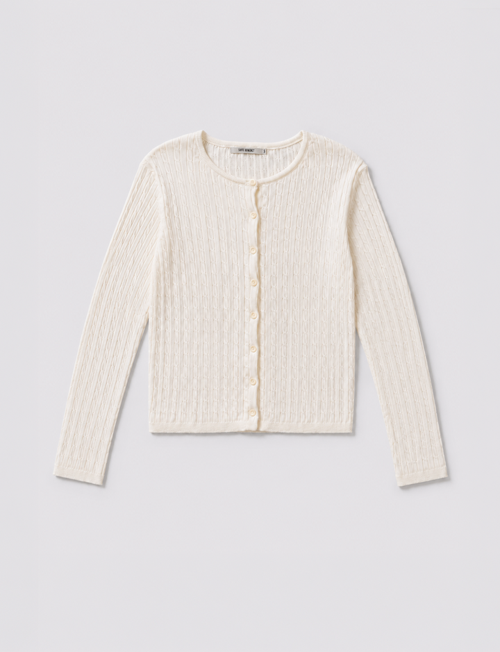 Cardigan in cotone panna con lavorazione a trecce still life frontale