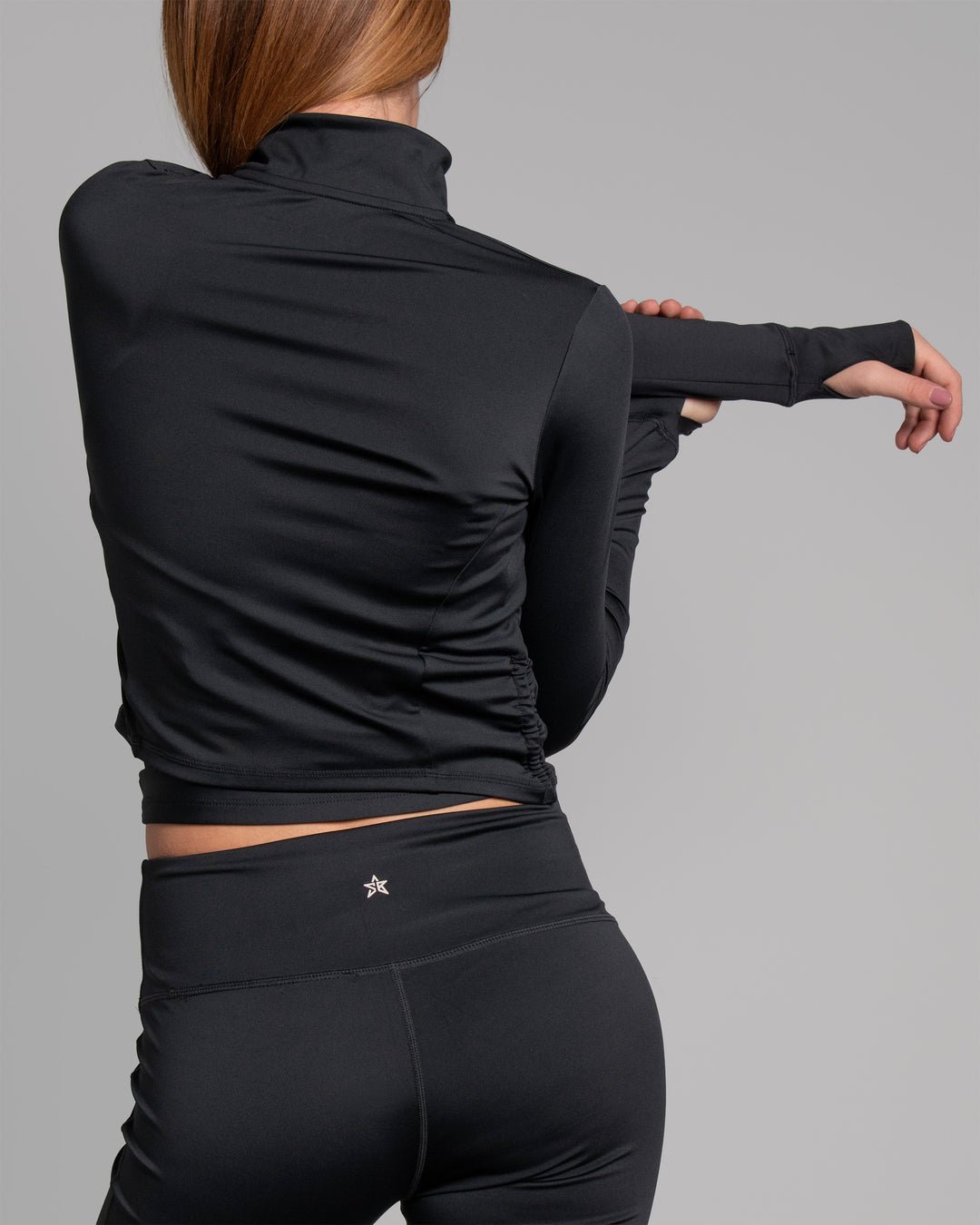 Giacca sportiva nera con zip retro
