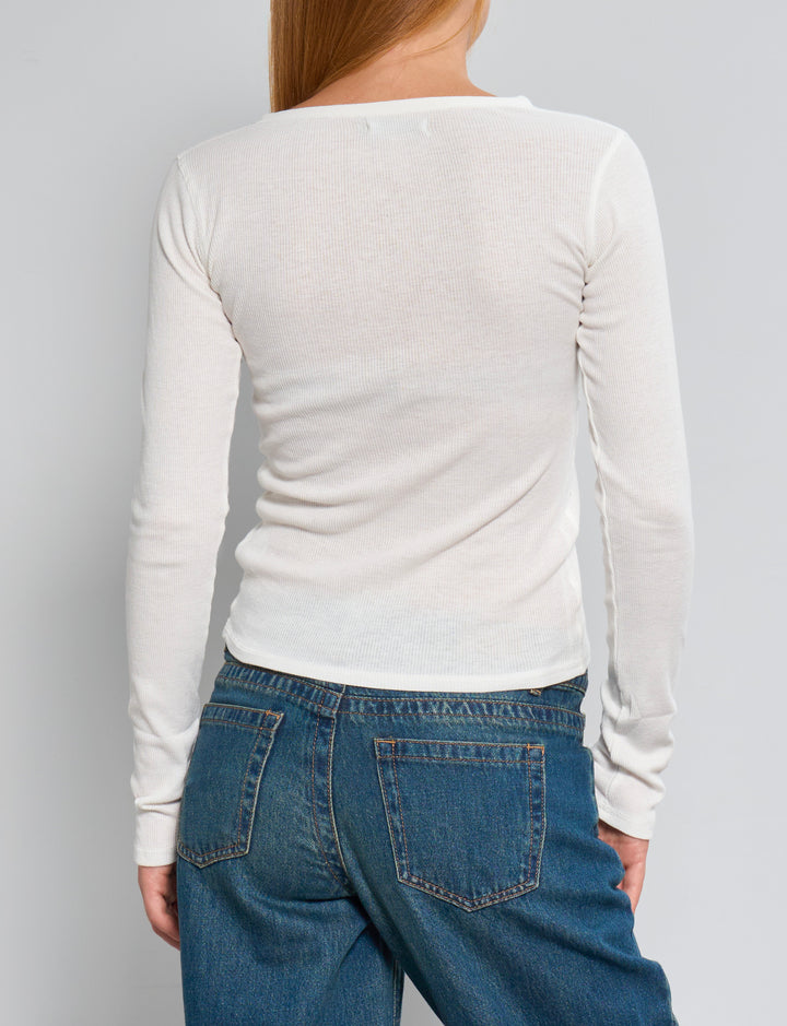 Maglia a maniche lunghe panna a costine con bottoncini frontali retro