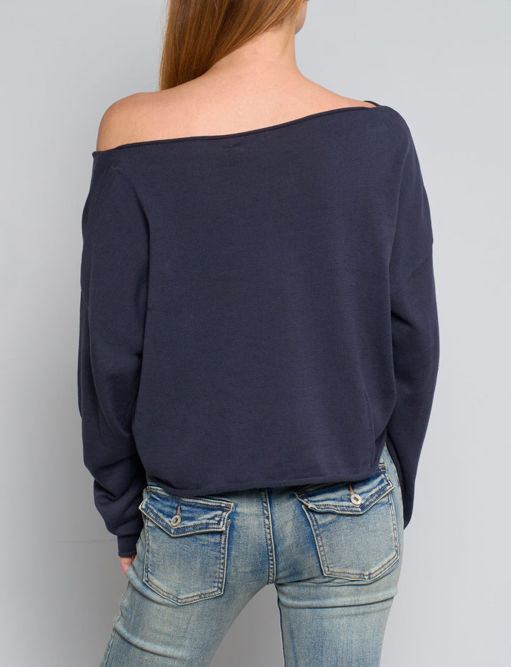 Maglia blu notte con scollo asimmetrico retro