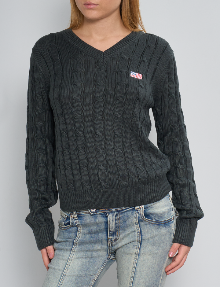 Maglione a trecce verde scuro con ricamo bandiera USA frontale