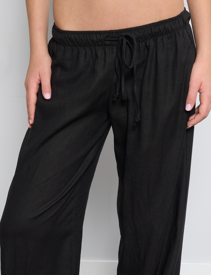 Pantalone in lino nero a palazzo dettaglio