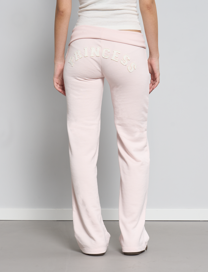 Pantalone rosa con fascia in vita rigirata e scritta "princess" retro