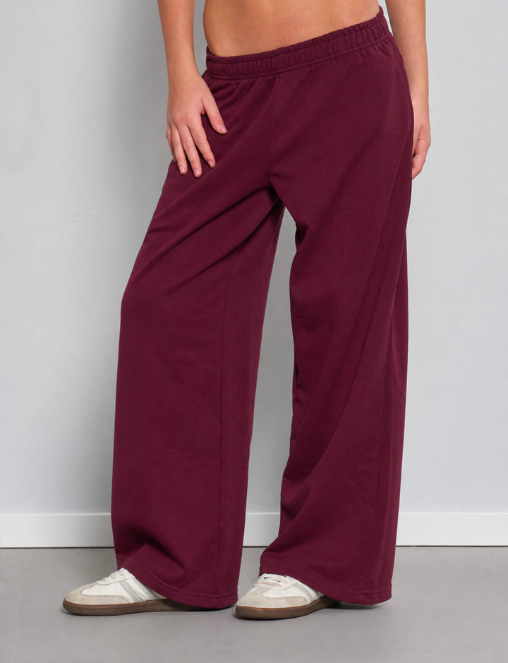Pantaloni tuta wide leg bordeaux in felpa frontale