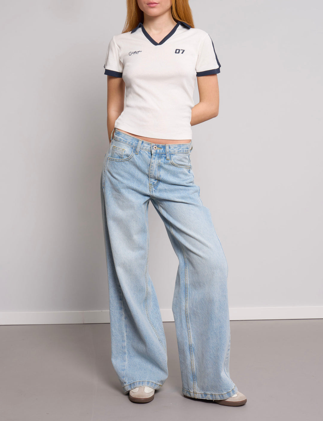 Polo a manica corta bicolor con stampe outfit
