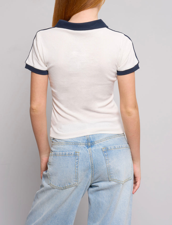 Polo a manica corta bicolor con stampe retro