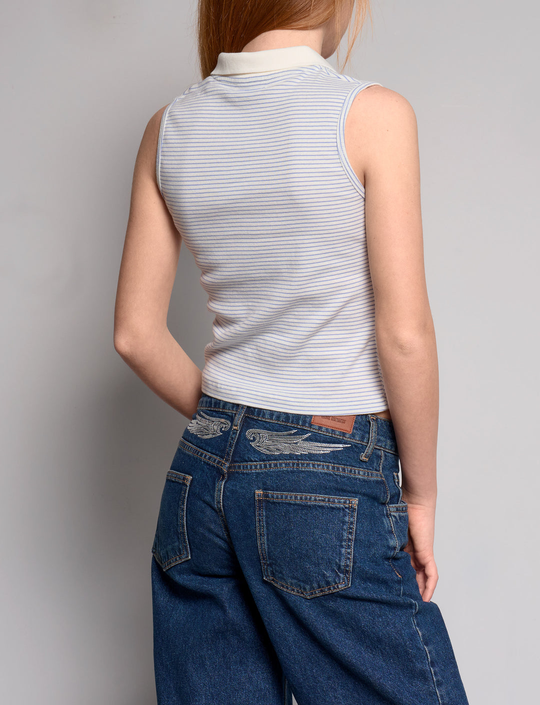 Polo smanicata a righe