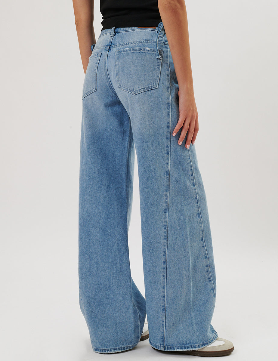 Jeans wide con fiocchetti