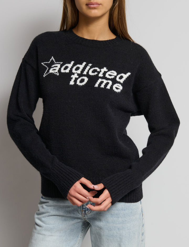 Maglione intarsio scritta