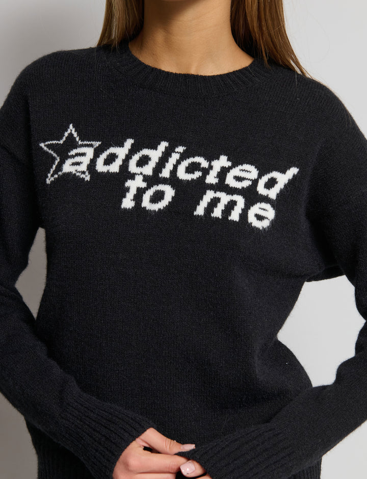 Maglione intarsio scritta