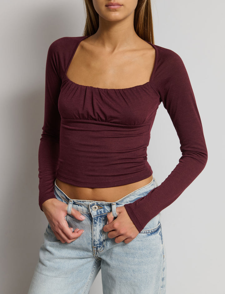 Top manica lunga con scollo arricciato