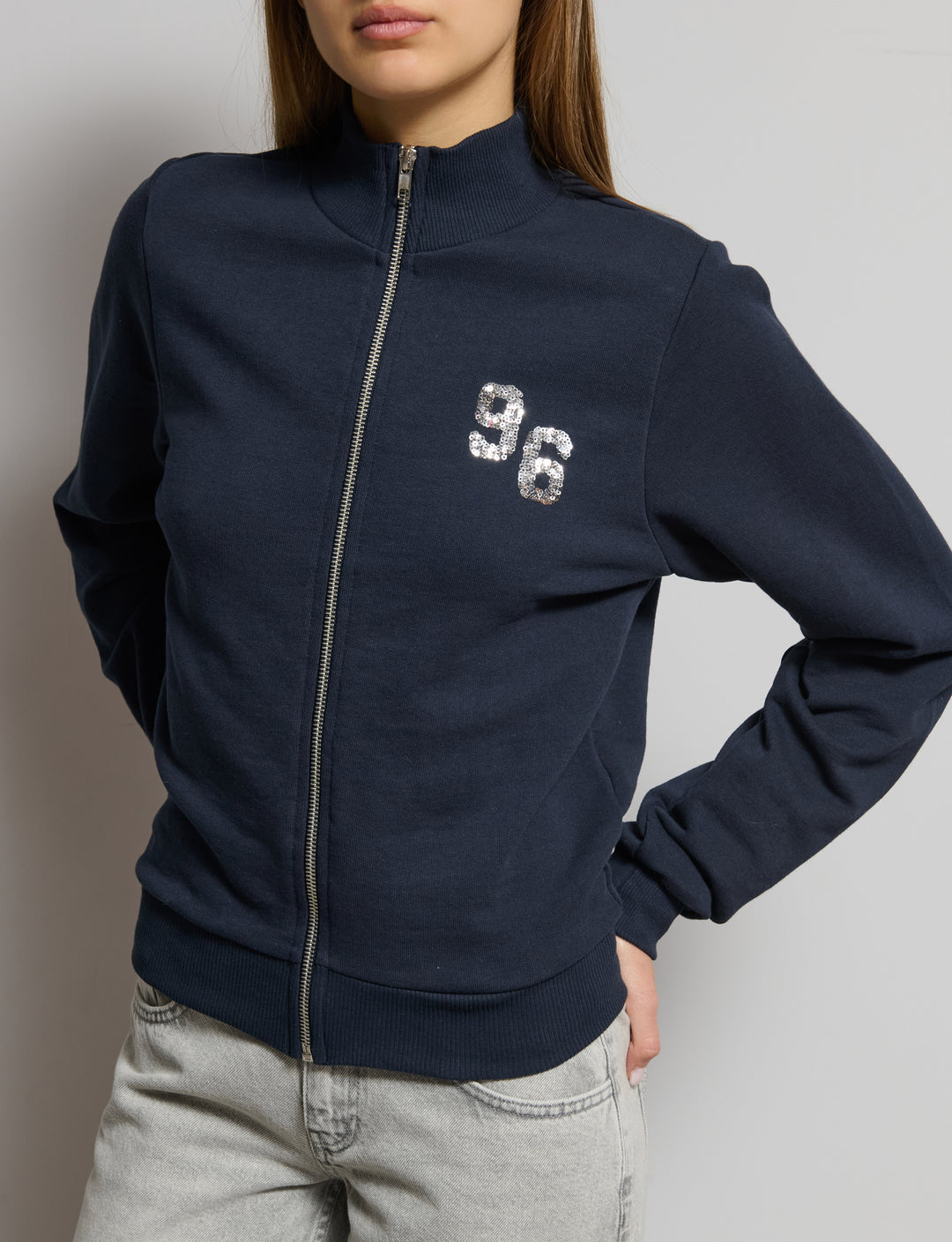 Felpa collo alto con paillettes