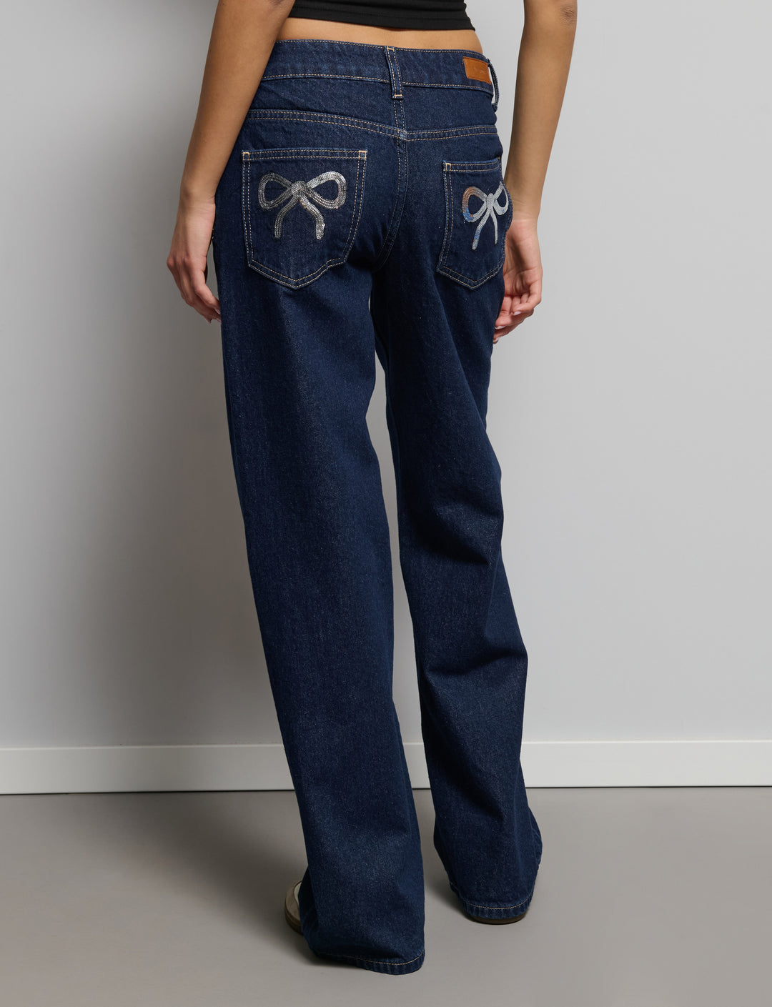 Jeans dritto fiocchi paillettes