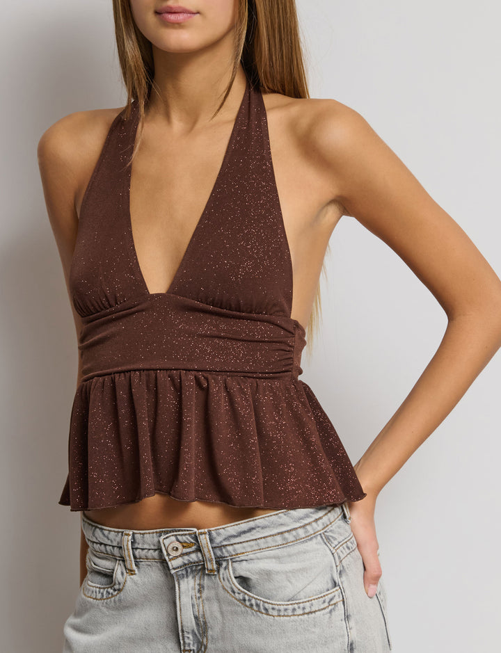 Top glitterato con balza