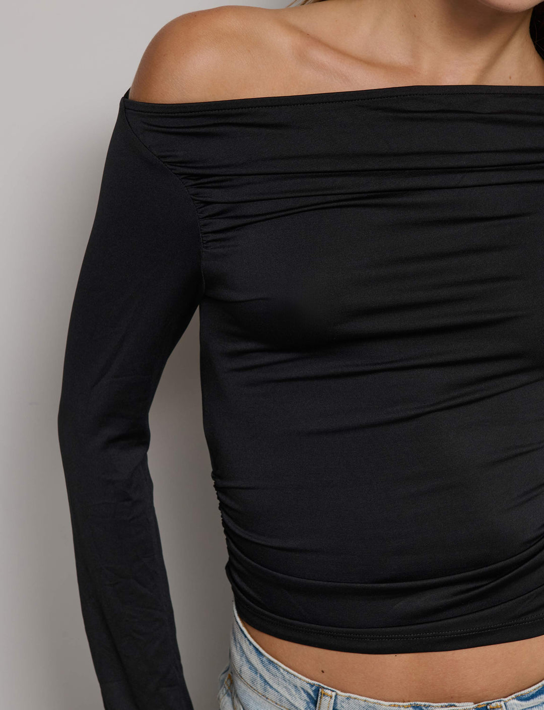 Top scollo asimmetrico