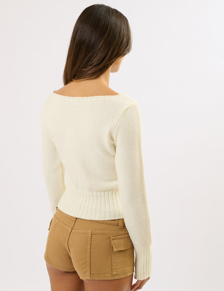 Maglia off-shoulder con intarsio