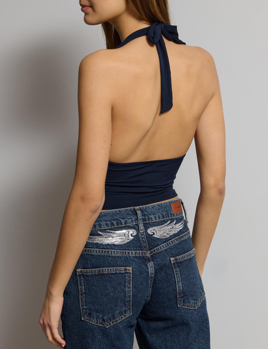 Top scollo Marilyn con dettaglio a V