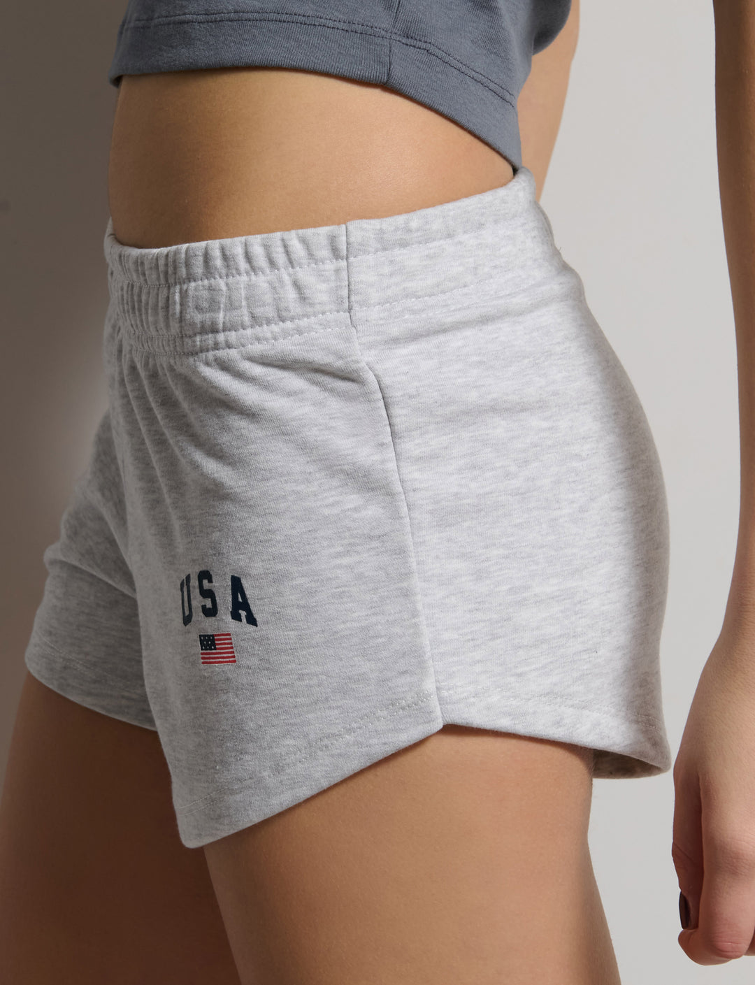 Short grigi in felpa con stampa USA