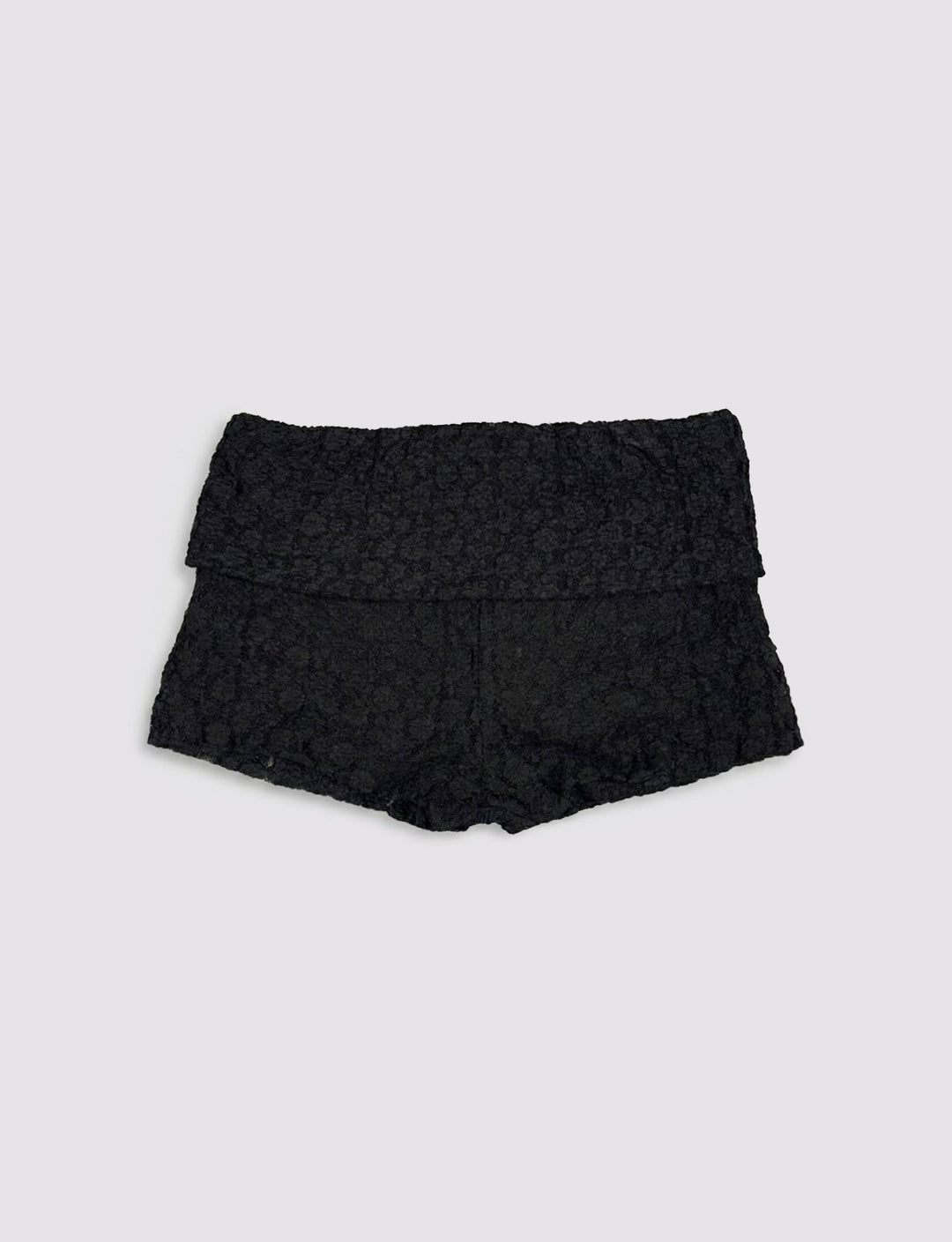 Short nero in pizzo still life