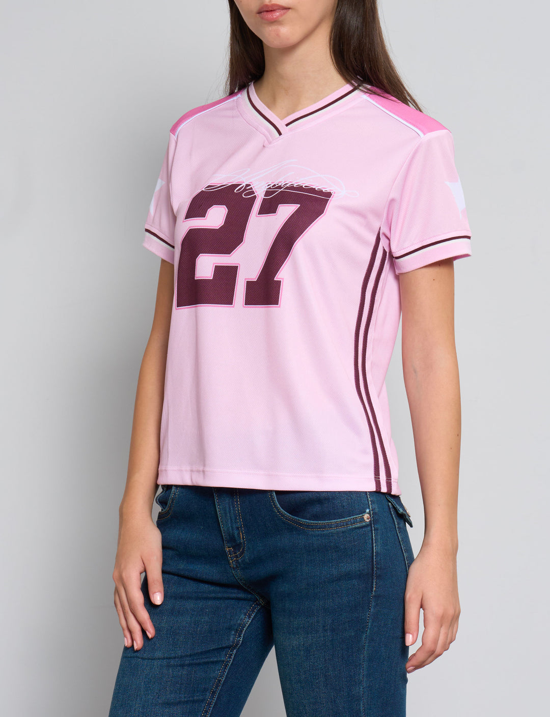 T-shirt da calcio rosa con numero 27 e scollo a V frontale