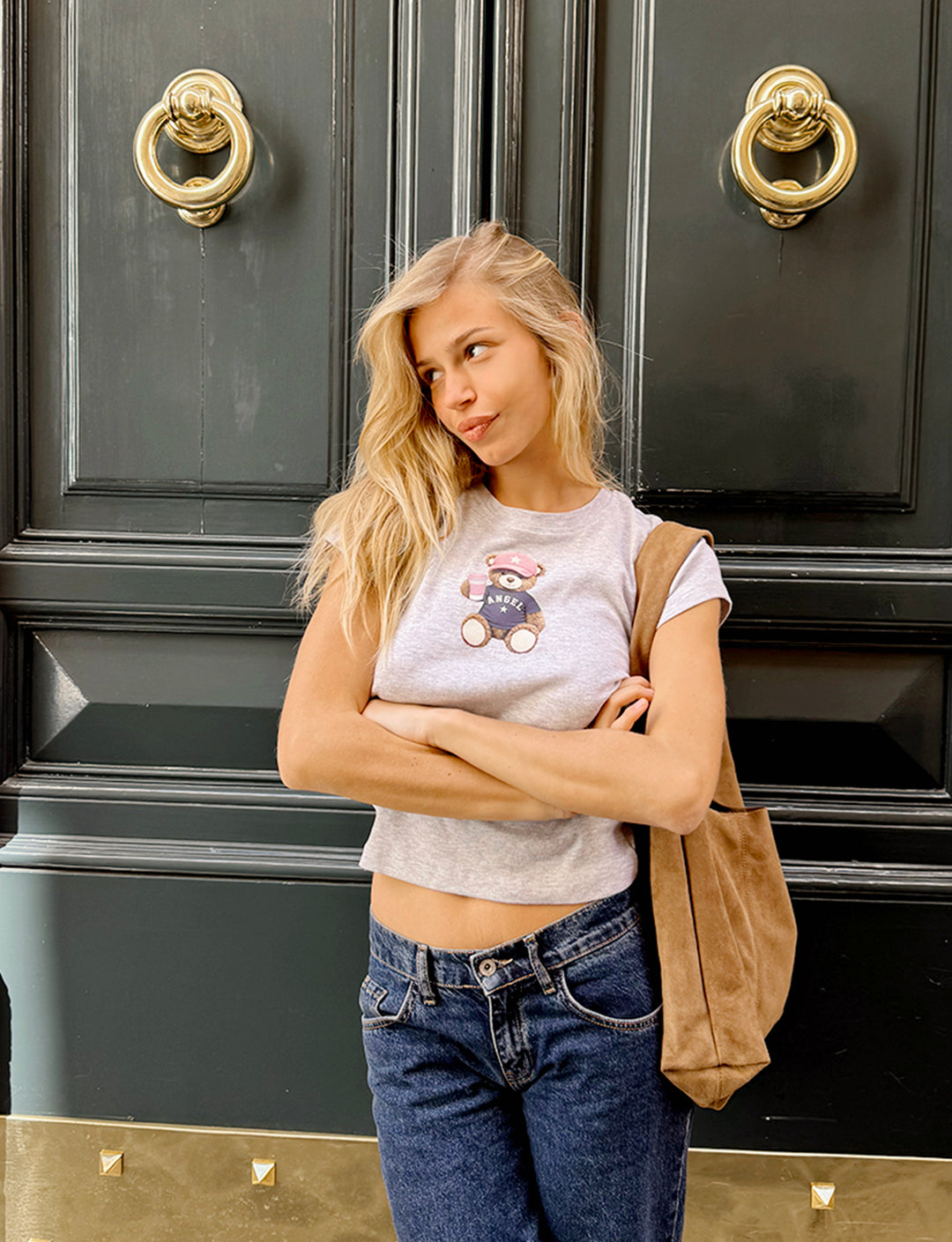 T-shirt grigia con stampa orsetto copertina